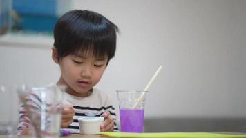 Boy playing with slime video