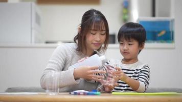 Parent and child making slime video