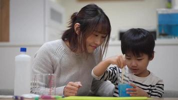 Parent and child making slime video