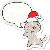 cute cartoon christmas cat and speech bubble distressed sticker vector