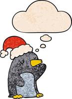 lindo pingüino de navidad de dibujos animados y burbuja de pensamiento en estilo de patrón de textura grunge vector