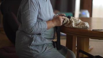 Woman handcrafting a bag video