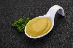 Mustard sauce in the bowl photo