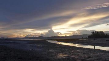 Timelapse sunset over muddy land video
