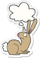 cartoon startled bunny rabbit and thought bubble as a printed sticker vector