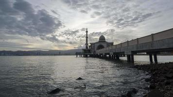 Timelapse sunset floating mosque.