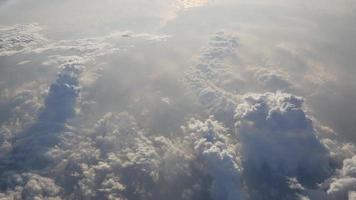 Cumulus cloud during sunset hour vire from plane video