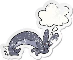 funny cartoon rabbit and thought bubble as a distressed worn sticker vector