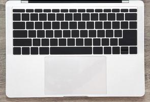 empty keyboard on table background photo