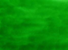 Blurred of background abstract green color watercolor on white paper splash by art hand drawn for text photo