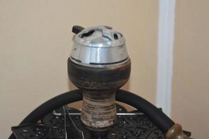 Modern Turkish and Egyptian hookah for smoking in the interior photo