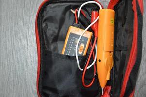 Tools for an electrician to install a fire alarm