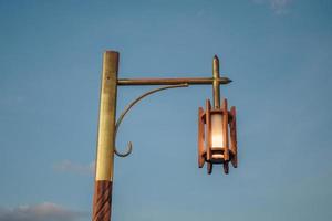 vintage old lamp at dusk, Sunset lamp, blue sky photo