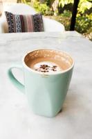 Mocha Coffee on a marble table. photo