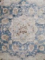 shabby carpet top view. the effect of an aged carpet. vintage texture for interior decor. photo