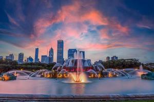 Passing clouds over Chicago Buckingham Fountain during sunset, Chicago, IL, USA photo