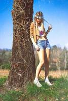 Girl hippie indie style in nature photo