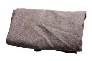 Gray wool fabric folded on a white background. photo