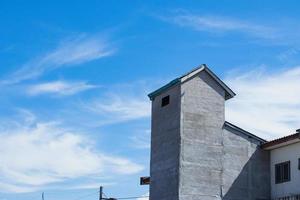 Swallow houses are used for farming and harvesting edible bird nests. photo