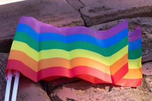 rainbow flags background, concept for lgbtqcelebrations in pride month photo