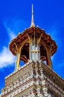 bell tower is located in Wat Phra Kaew. It's an old work of art. have a beautiful identity is a famous tourist attraction Located in Bangkok, Thailand photo