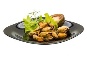 Marinated mussels on white photo