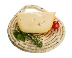 Maasdam cheese on board  isolated on white background photo