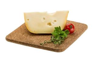 Maasdam cheese isolated on white background photo