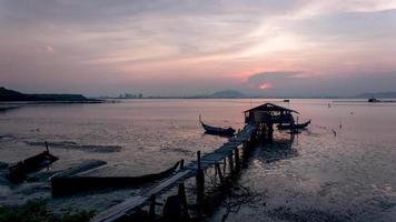 Timelapse sunrise of fisherman hut video