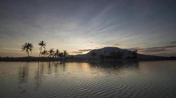 Timelapse morning sunrise over the Bukit Mertajam paddy field. video