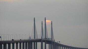 Timelapse sun rise over midspan of Penang Second Bridge video