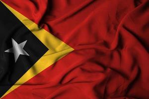 Selective focus of East Timor flag, with waving fabric texture. 3D illustration photo