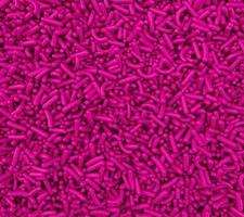 Pink Color sprinkle dots, decoration for cake and bakery, a lot of sprinkles as a background 3d illustration photo