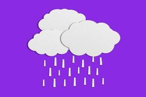 cloud and rain paper white paper cut paste paper Speech balloon on purple background. photo