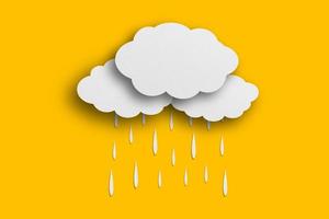 cloud and rain paper white paper cut and paste paper Speech balloon on yellow background. photo