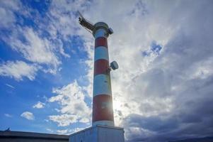 Red and White Lighthouse photo