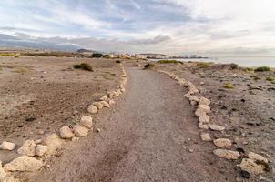 Empty Footpath in desert photo