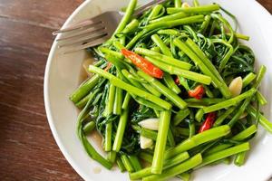 Fried morning glory light .Thai food. Pad pak boong is Thai traditional photo