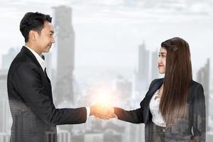 business success concept, Businessman And Businesswoman Shaking Hands. business people handshaking photo