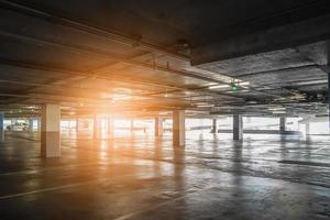 interior of empty vacant car parking garage in department store photo