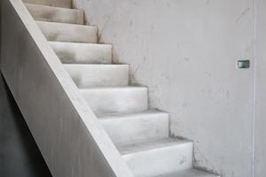 cement concrete stair in the under construction house at building site photo