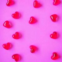 Valentines day background with heart shape candy photo