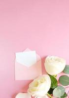 Flowers composition. Rose flower petals on pastel pink background. Valentines day, mothers day, womens day concept. Flat lay, top view, copy space photo