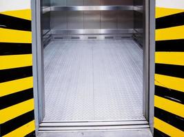 Modern elevator with open door photo