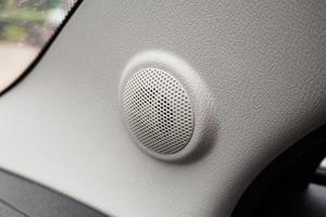 close up round speaker in modern car photo