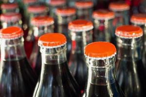 soft drinks in bottles background photo