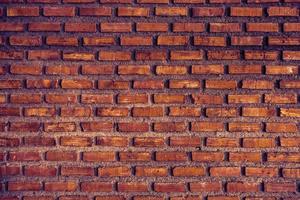 old grunge red brick wall texture background photo