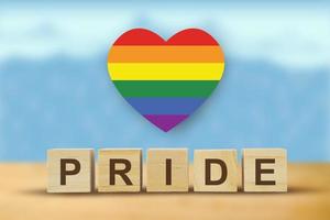 Pride on word letters cube, rainbow color. LGBT pride symbol concept photo