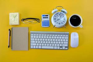 Office desk flat lay background with computer laptop and office equipment for work area copy space and education school concepts. photo