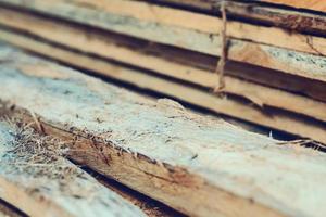Large stack of wood planks photo